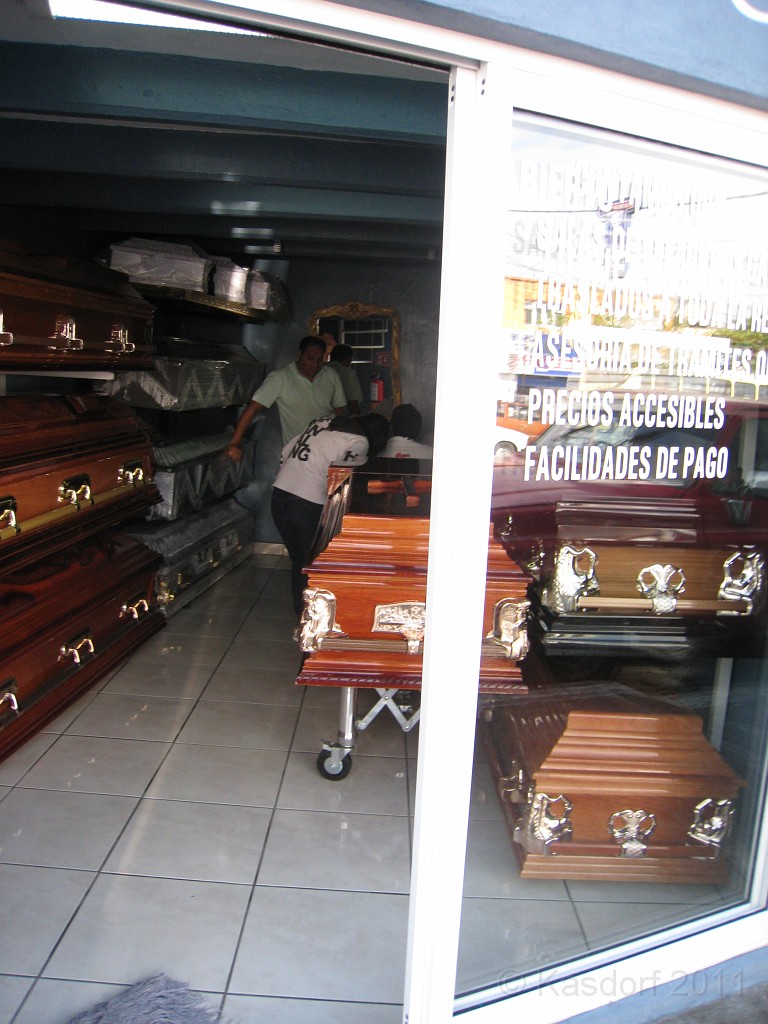 2011 Queretaro MX Half Marathon 225.JPG - The 2011 Queretaro Marathon on October 9. I was in town and was able to run the 21K, or 13.1 mile half marathon. Get your casket here.... and after you are done shopping here, go next door to .....